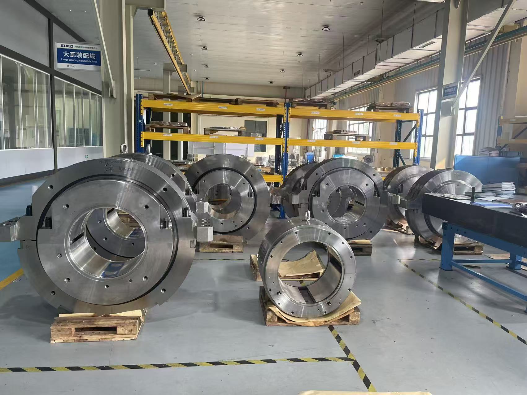 Large finished radial and thrust bearing assemblies ready before export dispatch